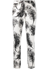 Moschino feather print high-waisted trousers