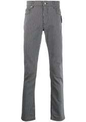 Moschino high-rise striped trousers