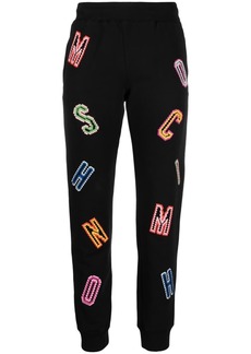 Moschino logo-embroidered cotton track pants
