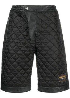 Moschino logo-patch diamond-quilted shorts