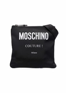 Moschino logo-print panelled messenger bag