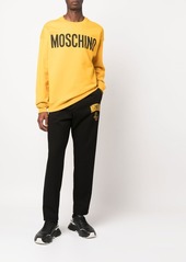 Moschino logo-print straight-leg trousers