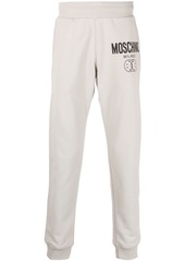 Moschino logo print tapered sweatpants