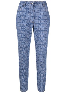 Moschino monogram-print skinny jeans
