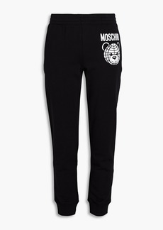 Moschino - Printed French cotton-terry track pants - Black - IT 38