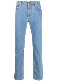 MOSCHINO SLIM JEANS WITH LOGO