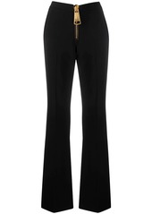 Moschino zipped flared trousers