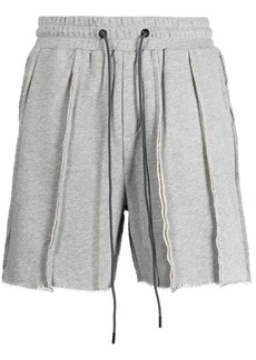 Mostly Heard Rarely Seen exposed-seam cotton track shorts