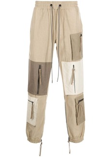 Mostly Heard Rarely Seen patchwork zip-pocket trousers