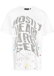 Mostly Heard Rarely Seen warped-text paint T-shirt