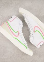 Nike Blazer Mid Infinite leather sneakers in white/electric green