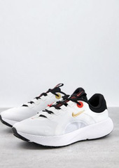 Nike Running Escape Run sneakers in white and gold
