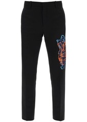 Off-white slim pants with graffiti patch