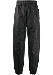 Off-White textured arrow track pants