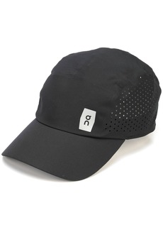 On perforated-detail cap