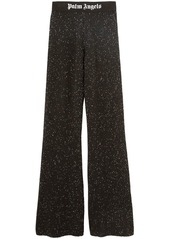 Palm Angels logo-print knitted flared trousers