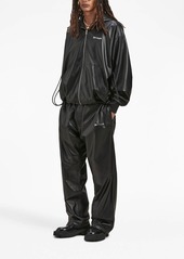 Palm Angels logo-print leather track pants