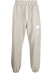 Palm Angels paint splatter track pants