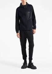 Prada logo-plaque slim-fit trousers