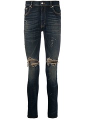 Represent mid-rise distressed slim jeans