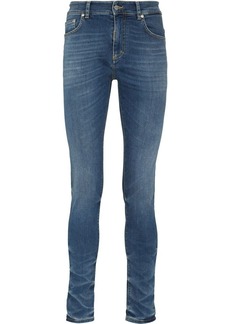 Represent mid-rise skinny jeans