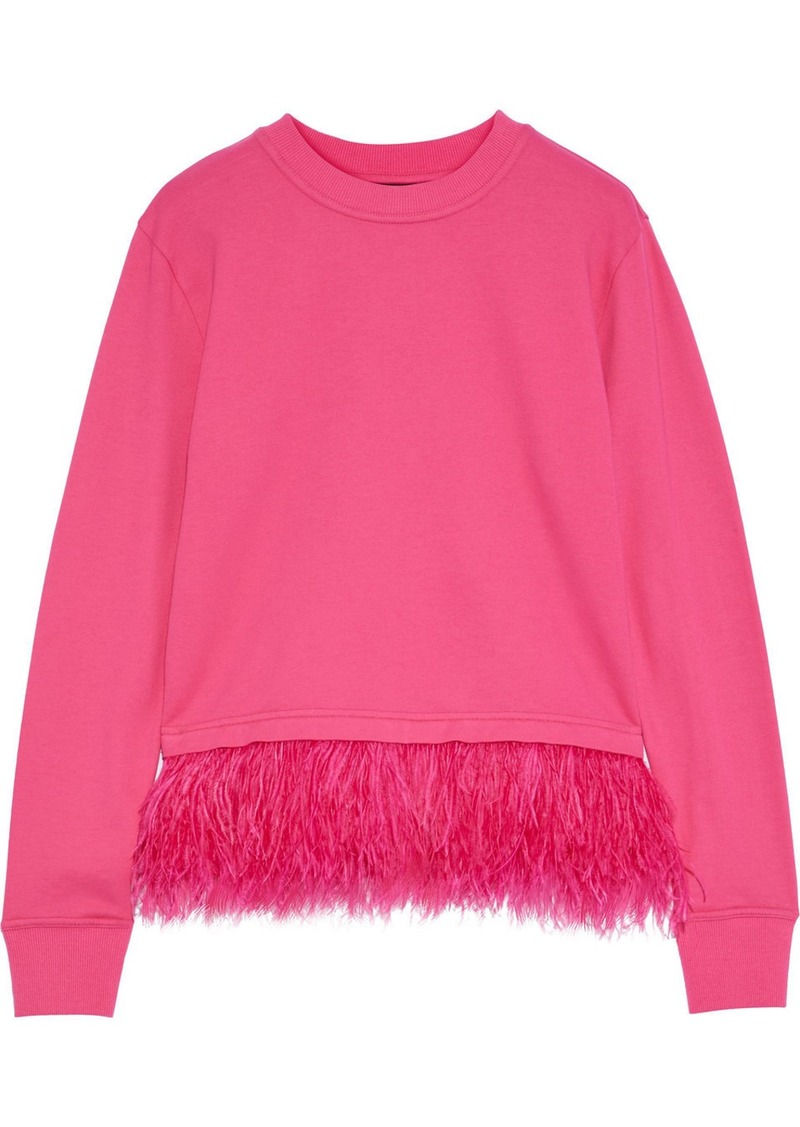 bright pink sweatshirt