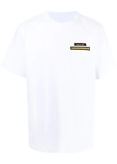 Sacai logo-patch oversized cotton T-shirt