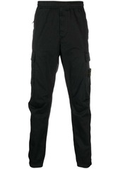 Stone Island logo-patch tapered-leg trousers