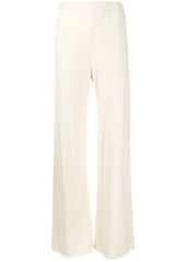 The Row flared trousers