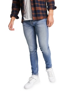 Topman UP Spec Stretch Skinny Jeans in Mid Blue at Nordstrom
