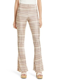 Topshop Checkerboard Print Flare Pants in Brown at Nordstrom