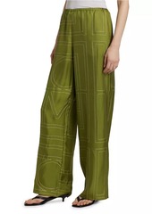 Totême Monogrammed Silk Straight-Leg Pants