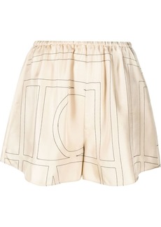 Totême monogram-print silk shorts