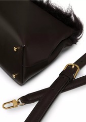 Totême Shearling T-Lock Leather Clutch