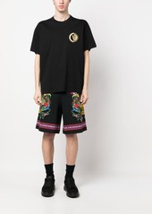 Versace abstract-print cotton track shorts