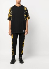 Versace baroque-pattern print panel trousers