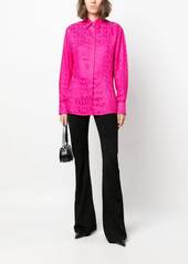 Versace Greca-knit flared trousers