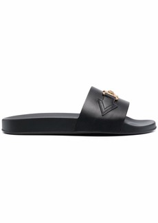 Versace Medusa logo slides