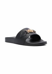 Versace Medusa logo slides