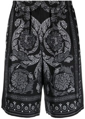 Versace trompe l'oeil print track shorts