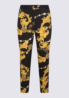 VERSACE JEANS COUTURE BLACK, YELLOW AND WHITE TROUSERS