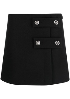 VERSACE Low-rise button skirt