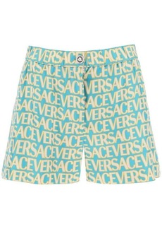 Versace monogram print silk shorts