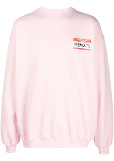Vetements Name Tag-print fleece sweatshirt