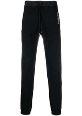 Yves Saint Laurent embroidered-logo cotton track pants