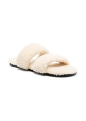 Yves Saint Laurent shearling flat slides